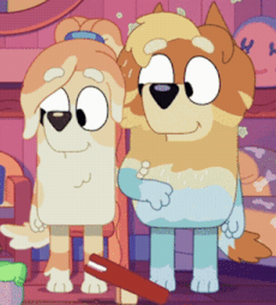 Two Cartoon Dogs Next To Each Other GIF