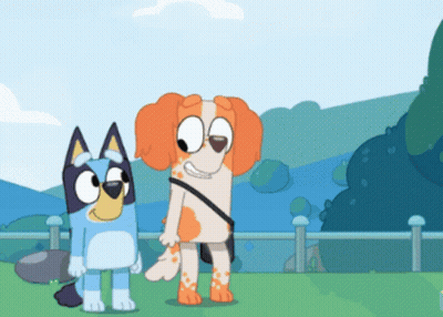 Two Cartoon Dogs Standing On Grassy Field GIF