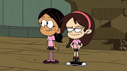 Two Cartoon Girls Are Standing Next To Each Other One Is Wearing A Pink Shirt With A Heart On It GIF