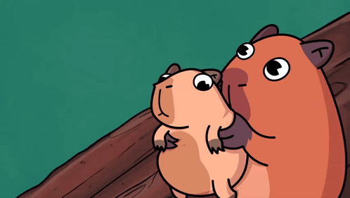 Two Cartoon Hamsters Are Hugging Each Other And One Has The Letter K On Its Head GIF