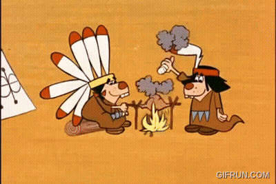Two Cartoon Native Americans Sitting Around Campfire GIF