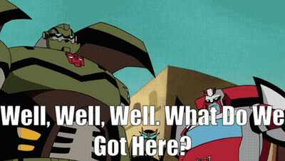 Two Cartoon Robots Are Standing Next To Each Other With The Words Well Well Well What Do We Got Here GIF