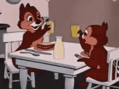 Two Cartoon Squirrels Drinking Milk GIF