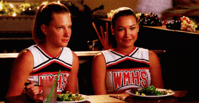 Two Cheerleaders from WMHS Sitting at Table