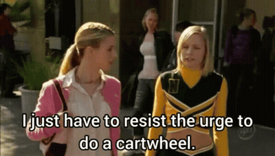 Two Cheerleaders One In Yellow And Black Outfit With Letter N GIF