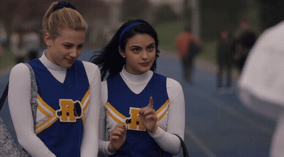Two Cheerleaders Wearing RC Uniforms GIF