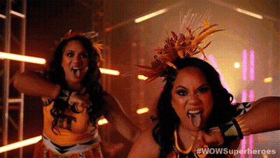 Two Cheerleaders With Tongues Out #WowSuperheroes GIF