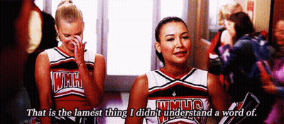 Two Cheerleaders With Wmhs On Their Shirts GIF