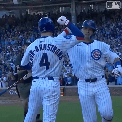 Two Chicago Cubs Baseball Players High Five Each Other GIF