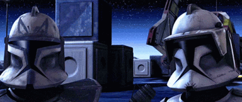 Two Clone Troopers Standing In Dark Room GIF