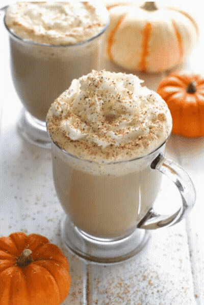 Two Coffee Cups With Whipped Cream And Pumpkin Spice GIF