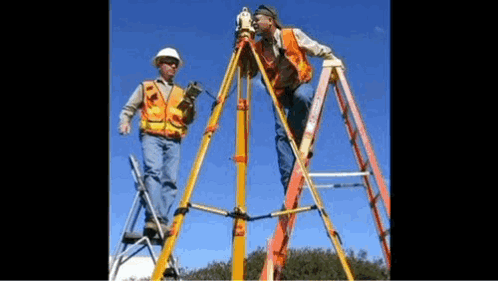 Two Construction Workers Are Working On A Tripod And Ladder GIF