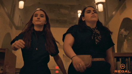 Two Cool Woman With Manly Walk GIF