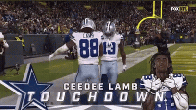 Two Cowboys Football Players Are Celebrating A Touchdown With The Words Touchdown On The Bottom GIF