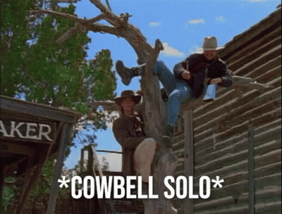 Two Cowboys Sitting On Tree With Cowbell Solo GIF