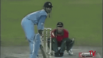 Two Cricket Players Playing On Field With Sports TV Logo GIF