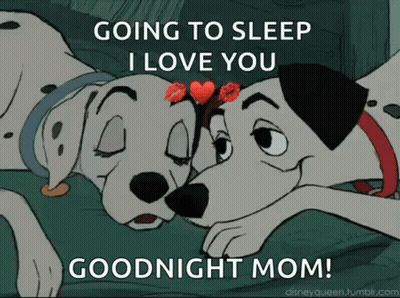 Two Dalmatians Laying On Bed GIF