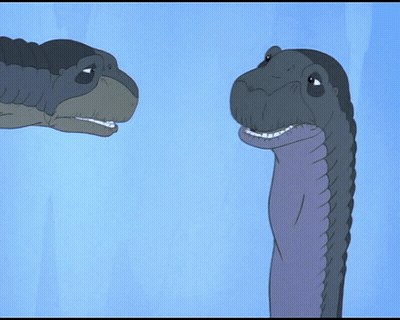 Two Dinosaurs One Smiling GIF