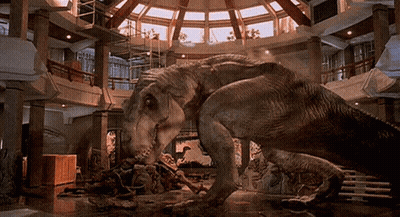 Two Dinosaurs Standing In Room GIF