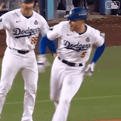 Two Dodgers Baseball Players Running GIF