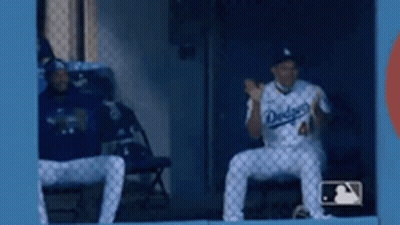 Two Dodgers Baseball Players Sitting GIF