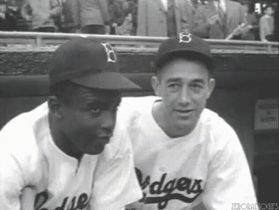 Two Dodgers Players Sitting Together In Dugout GIF