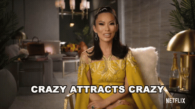 Two Drag Queens One In Red Sequined Dress GIF