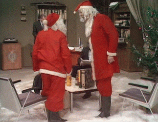 Two Drunk Santa Fighting GIF