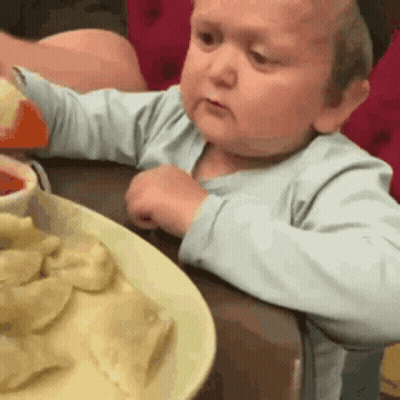 Two Dumplings Shaking Hands Saying Witam Nowego Pierozka GIF
