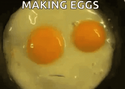 Two Eggs Cooking In Frying Pan Making Eggs GIF