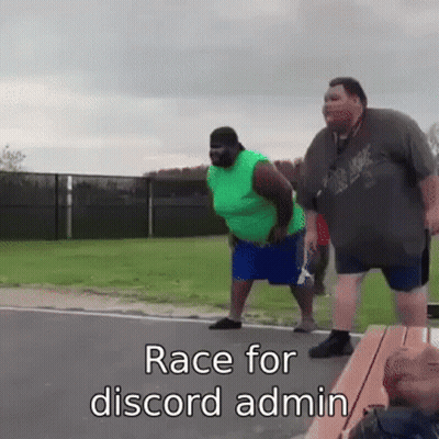 Two Fat Men Standing Together On Roadside GIF