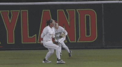 Two Female Baseball Players Running Cleveland Banner GIF