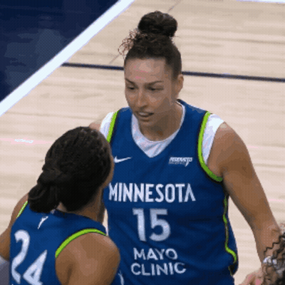 Two Female Basketball Players From Minnesota Mayo Clinic Are Talking To Each Other GIF