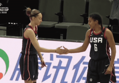 Two Female Basketball Players From The Usa Shake Hands On The Court GIF