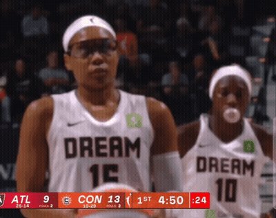 Two Female Basketball Players In Dream Jerseys GIF