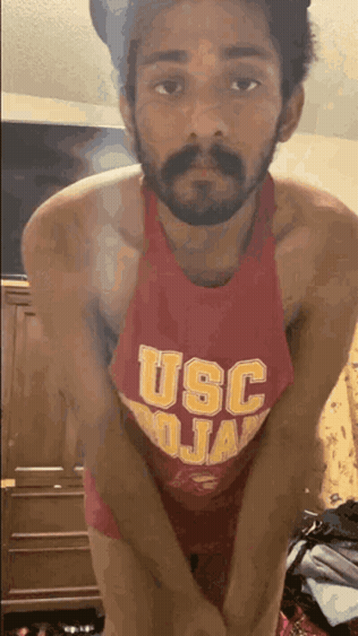 Two Female Basketball Players In Red USC Jerseys GIF