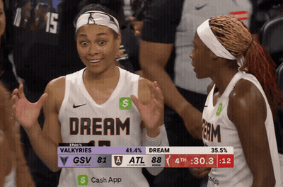 Two Female Basketball Players Wearing Dream Jerseys GIF