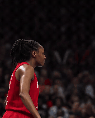Two Female Basketball Players Wearing Red Jerseys One With The Number 8 On It GIF