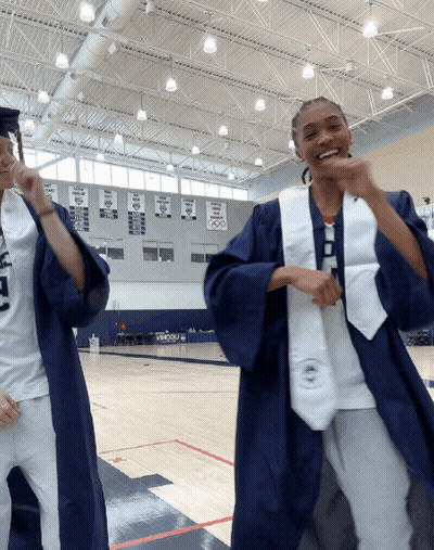 Two Female Graduates Dancing GIF
