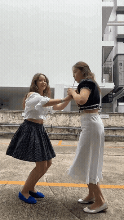 Two Female Soccer Players Hugging On Field With TDP GIF