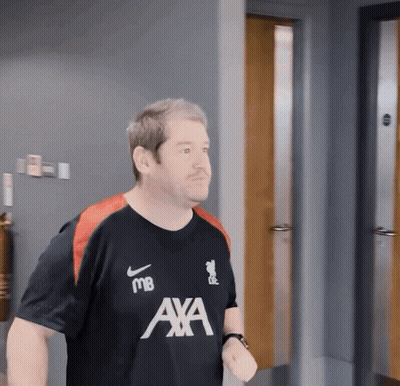 Two Female Soccer Players In Red Standard Chartered Uniforms GIF