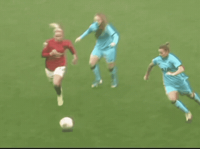 Two Female Soccer Players Playing GIF