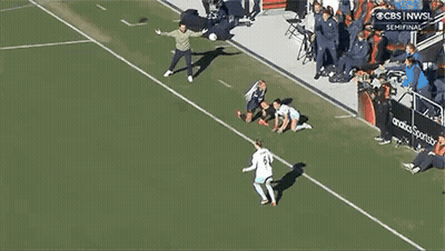 Two Female Soccer Players Talking On Field GIF