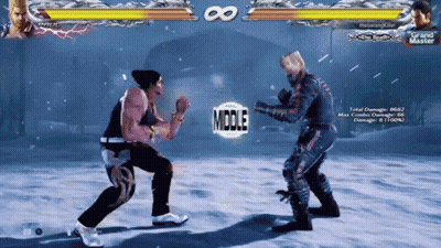 Two Fighters Are Fighting In A Video Game With The Word Middle In The Middle Of The Screen GIF