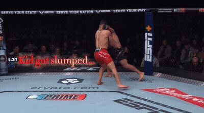 Two Fighters In A Ring With The Words Kid Got Slumped On The Screen GIF