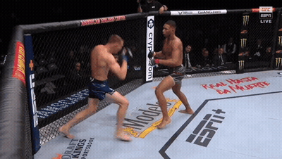 Two Fighters In Boxing Ring With ESPN On Corner GIF