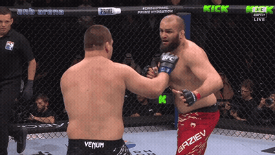 Two Fighters In Boxing Ring With Venum Shorts GIF