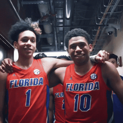 Two Florida Basketball Players Posing For A Photo GIF