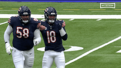 Two Football Players #58 And #18 GIF