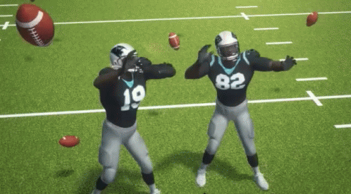 Two Football Players Are Dancing On A Field With The Words Fumble Above Them GIF